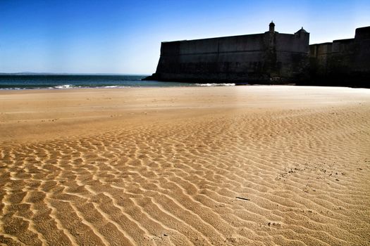 Beautiful beach called Praia da Torre in Lisbon, Portugal, in a sunny day of Spring