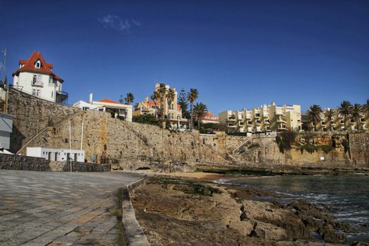 Beautiful Azarujinha beach with rock formations in Estoril, Lisbon, Portugal, in a sunny day of winter