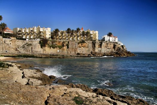 Beautiful Azarujinha beach with rock formations in Estoril, Lisbon, Portugal, in a sunny day of winter