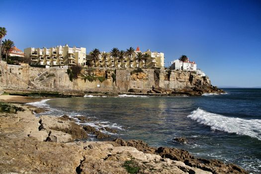 Beautiful Azarujinha beach with rock formations in Estoril, Lisbon, Portugal, in a sunny day of winter