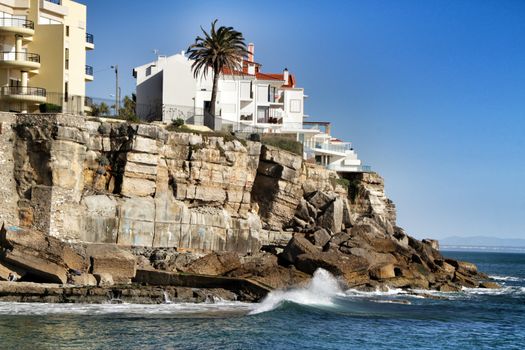 Beautiful Azarujinha beach with rock formations in Estoril, Lisbon, Portugal, in a sunny day of winter