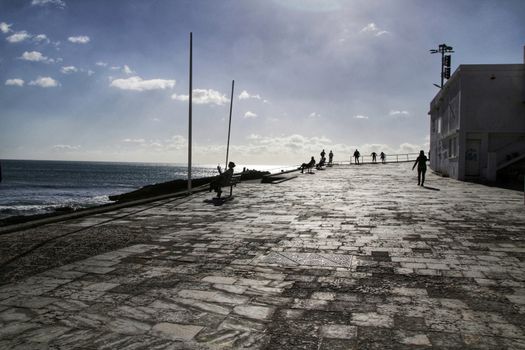 Beautiful Azarujinha beach with rock formations in Estoril, Lisbon, Portugal, in a sunny day of winter