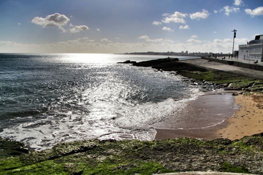 Beautiful Azarujinha beach with rock formations in Estoril, Lisbon, Portugal, in a sunny day of winter
