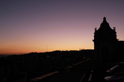 Beautiful sunset on a roof in Lisbon in winter