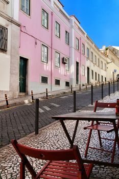 Narrow and colorful streets, majestic facades, windows and balconies of Lisbon, Portugal