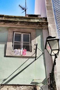 Old and typical facade in the street of Lisbon