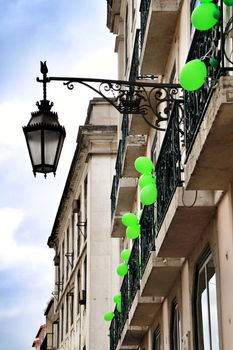 Narrow and colorful streets, majestic facades, windows and balconies of Lisbon, Portugal