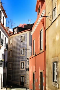Old colorful houses and narrow streets of Lisbon, Portugal in Spring.