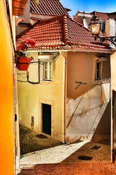 Narrow and colorful streets, majestic facades, windows and balconies of Lisbon, Portugal