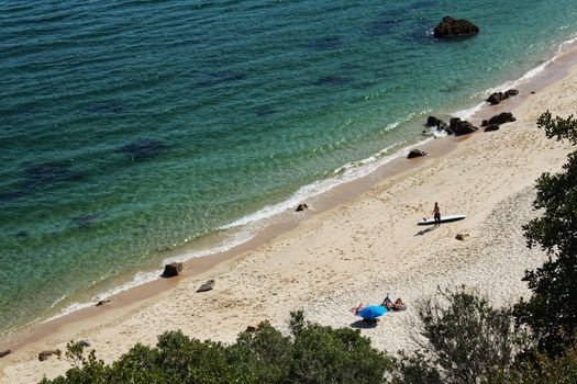 Crystalline waters of Galapinhos Beach between mountains in Portugal