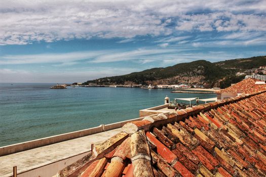 Sesimbra village views from the roof under blue sky in spring