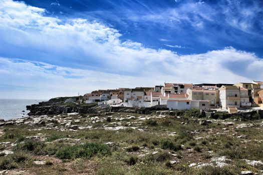 Views of the Peniche village and wild Atlantic Ocean with beautiful cliffs and beaches in Portugal