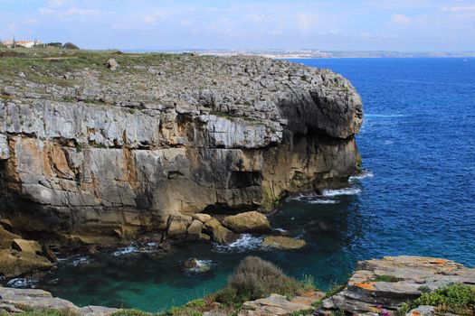Views of the wild Atlantic Ocean with beautiful cliffs and beaches in Peniche, Portugal