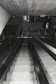 Escalators at the Orient Station in Lisbon, Portugal. Monochrome photography.