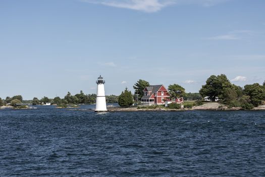 Lighthouse for pleasure ships, boats and yachts on one of the islands on the St. Lawrence River