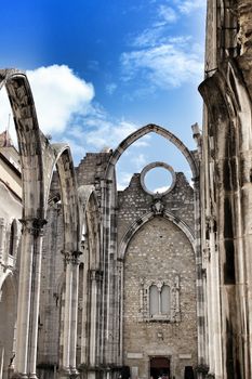 Arcades, pillars and facade of Do Carmo convent in Lisbon, Portugal