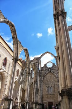 Arcades, pillars and facade of Do Carmo convent in Lisbon, Portugal