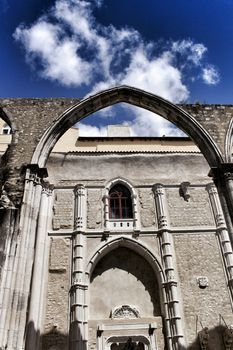 Arcades, pillars and facade of Do Carmo convent in Lisbon, Portugal