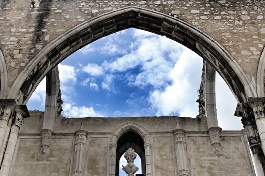 Arcades, pillars and facade of Do Carmo convent in Lisbon, Portugal