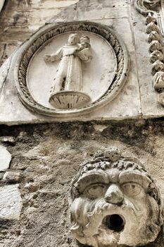 Arcades, pillars windows and details of Do Carmo convent in Lisbon, Portugal