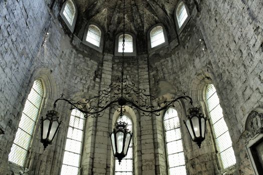 Arcades, pillars windows and details of Do Carmo convent in Lisbon, Portugal