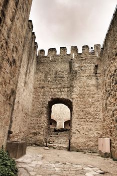 Old stone walls of Saint George castle in Lisbon, Portugal