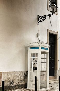 Old and colorful public telephone box in Lisbon