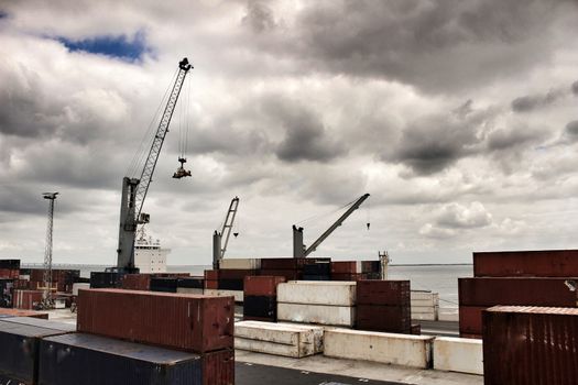 Crane and containers on the dock in the port of Lisbon, Portugal