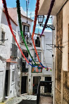 Lisbon, Portugal- June 3, 2018: Streets adorned with garlands for the festivities of Saint Anthony in the Alfama neighborhood in Lisbon