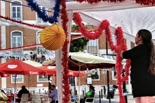 Lisbon, Portugal- June 8, 2018: Streets adorned with garlands for the festivities of Saint Anthony in the Alfama neighborhood in Lisbon