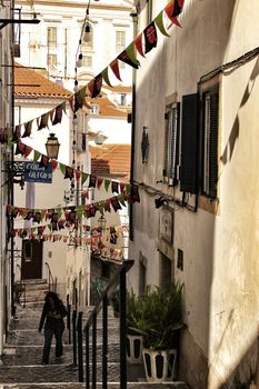 Lisbon, Portugal- June 8, 2018: Streets adorned with garlands for the festivities of Saint Anthony in the Alfama neighborhood in Lisbon