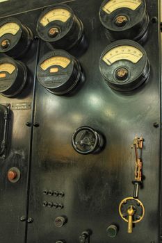 Lisbon, Portugal- June 15, 2018: Old black vintage electrical transformers in a factory