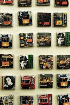 Fridge souvenir magnets imitating portuguese tiles with trams for sale
