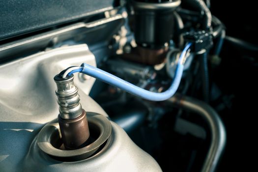 details of modern car engine, shallow depth of field, close up of engine compartment