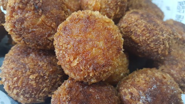 Closeup view of fried pizza bomb or pizza balls. Pizza bombs are delicious and tasty altered form of pizza.