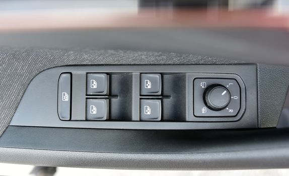 Side mirror switch control, car interior detail