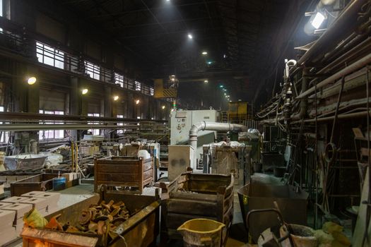 mess in the old foundry, dusty and dirty internals.