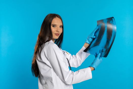 The pulmonologist checks the patient's lungs for any disturbing changes.
