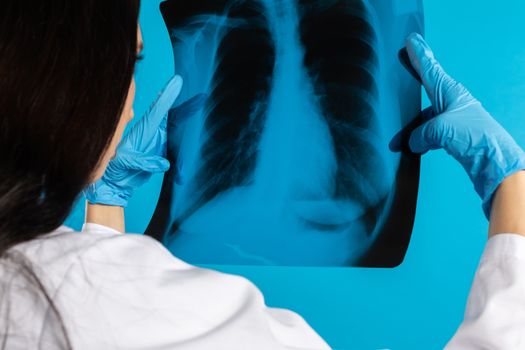 The pulmonologist checks the patient's lungs for any disturbing changes.