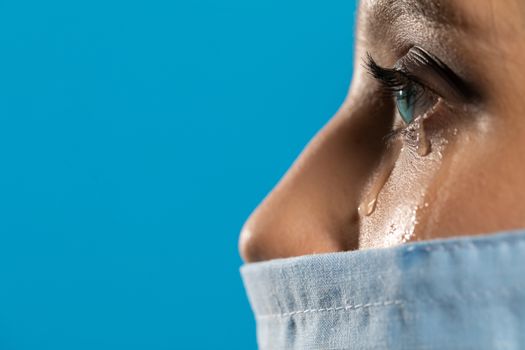 The doctor shed a tear after the death of a patient who passed away so young.