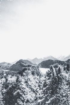 Christmas card with snowy mountains landscape in winter, monochrome photograph for art prints and printable designs