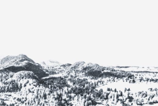 Christmas card with snowy mountains landscape in winter, monochrome photograph for art prints and printable designs