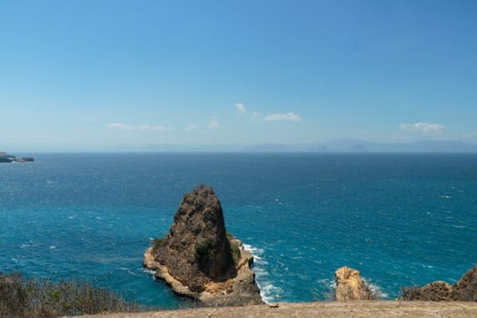 Hidden Beach with big rock formation on Tanjung Bloam in East Lombok, Indonesia. Biggest Rock in beautiful beach Tanjung Beloam.