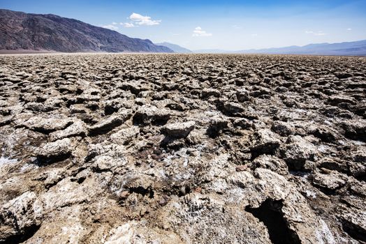 Vast salt desert of Devil's Golf Course in Death Valley National Park. California, USA
