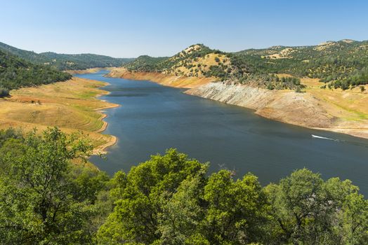 Lake and a dam of Beardsley Reservoir are located on Stanislaus river. California, USA