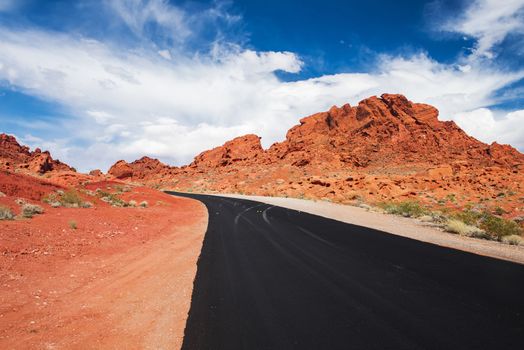 Road and red rocks in Valley of Fire State Park, Nevada, USA