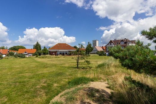 Landscape  on Poel island at the Baltic sea with green vegetation and Timmendorf in the background