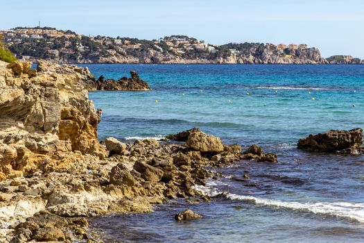 Rocky coast at Peguera in the west of Mallorca on a sunny day in spring