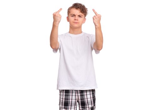 Portrait of angry teen boy showing middle fingers, isolated on white background