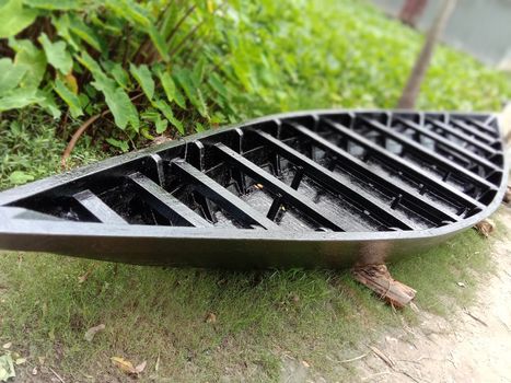 black color wooden boat closeup with nature